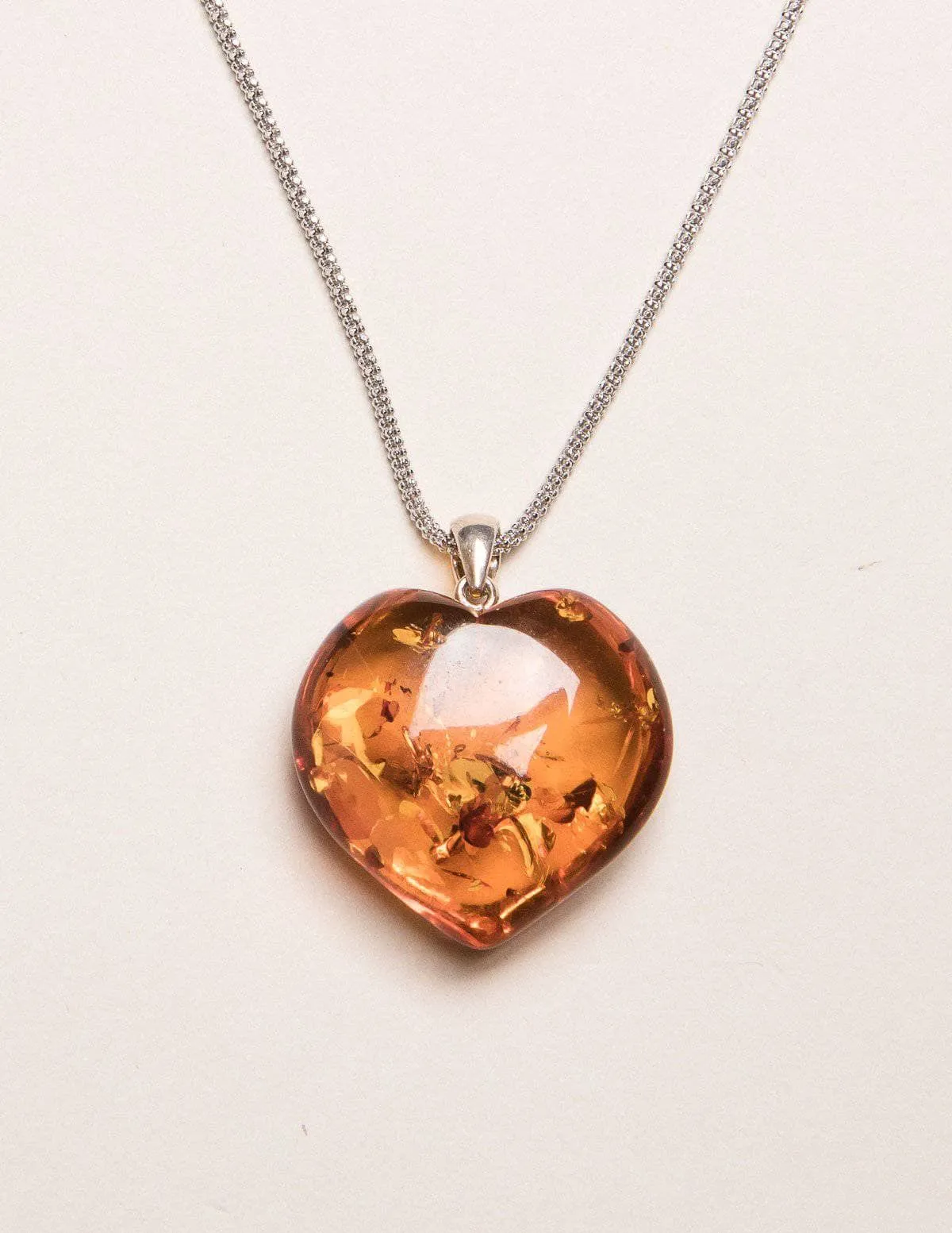 Amber Heart Pendant on Silver Chain